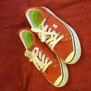 Red Cariuma suede shoes